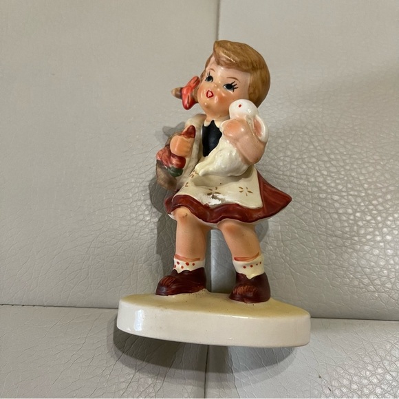 Vintage Hand Painted Lefton girl holding a bunny looks like a Hummel no flaws - Picture 1 of 8
